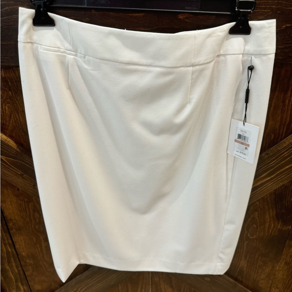 Calvin Klein cream colored lined skirt. Size 12 new with tags